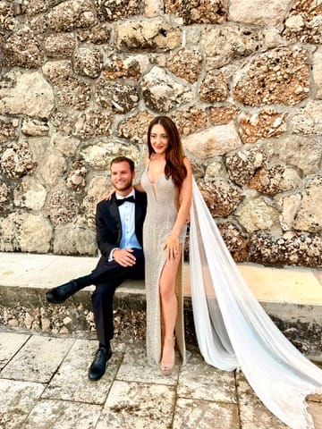 Carlie and her husband at Prora, the night before their wedding